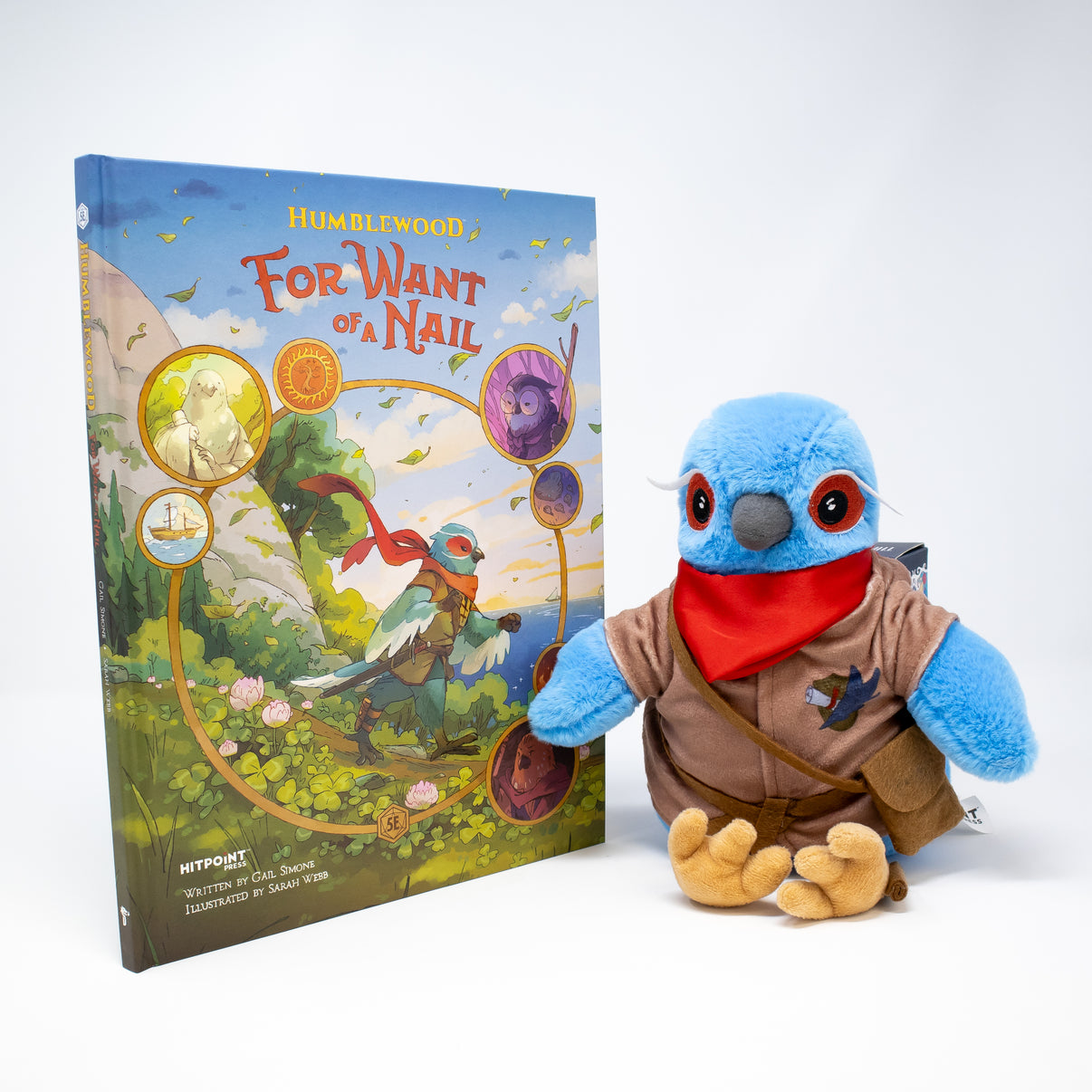 Plush toy resembling Flit a character from a book titled 'Humblewood: For Want of a Nail' on a white background